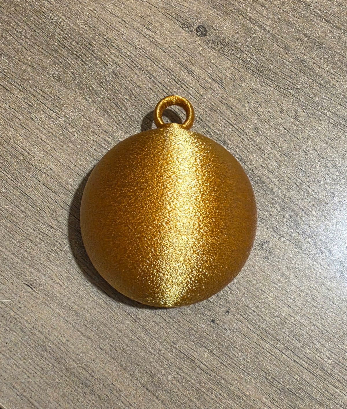Boule de Noël Ribellu Corse dorée –